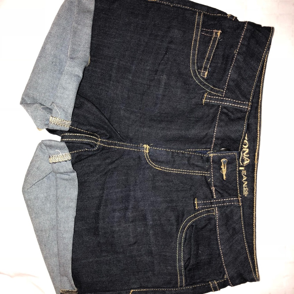 Dark colored mid rise shorts